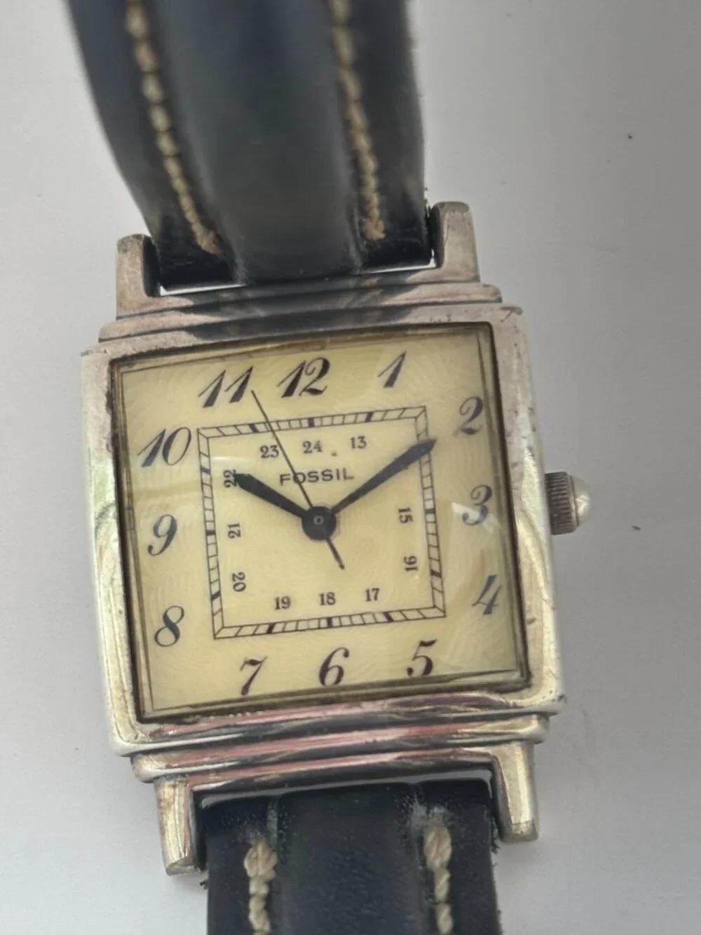 Vintage Fossil watch in Art Deco style with silver bezel and square face